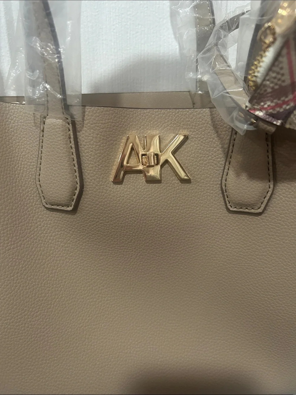 Anne Klein “Montana.” NWT Stone color. AKH4518. W/ coin purse.Turn lock in front